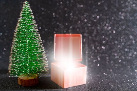 Christmas tree and gift box. Festive christmas background.の写真素材