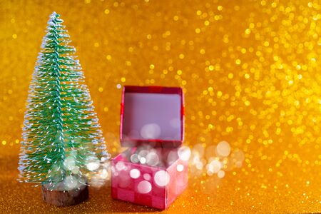 Christmas tree and gift box. Festive christmas background.の写真素材