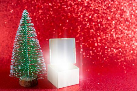 Christmas tree and gift box. Festive christmas background.の写真素材