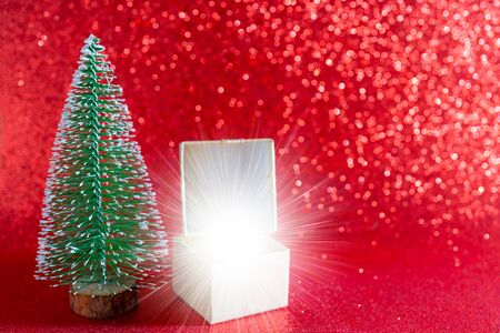 Christmas tree and gift box. Festive christmas background.の写真素材