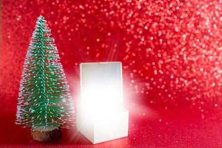 Christmas tree and gift box. Festive christmas background.の写真素材