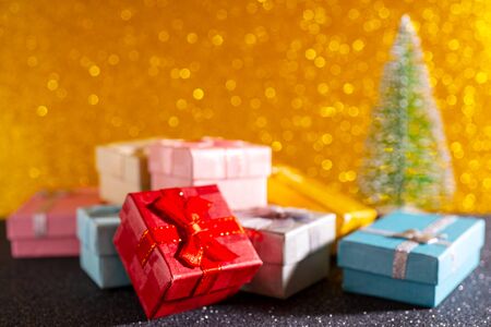 Christmas tree and gift box. Festive christmas background.の写真素材