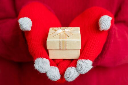 Christmas gift box. Festive composition. Red background.の写真素材