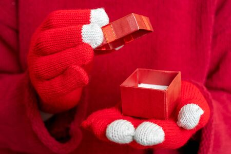 Christmas gift box. Festive composition. Red background.の写真素材