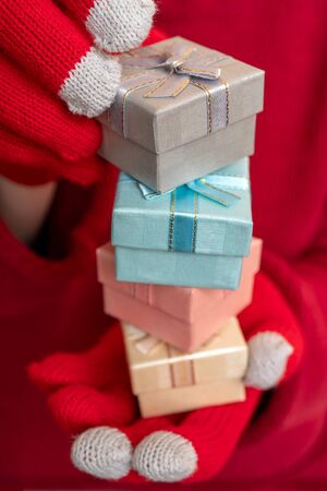 Christmas gift box. Festive composition. Red background.の写真素材