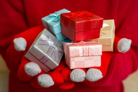Christmas gift box. Festive composition. Red background.の写真素材