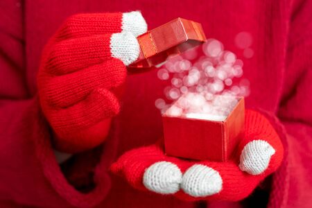 Christmas gift box. Festive composition. Red background.の写真素材