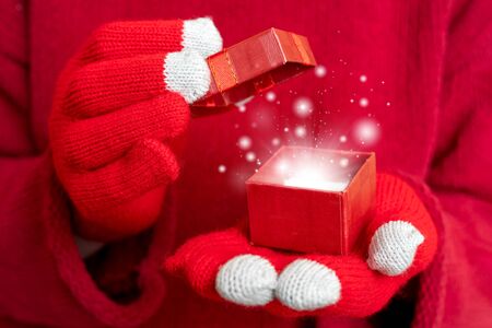 Christmas gift box. Festive composition. Red background.の写真素材