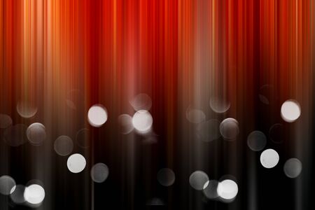 Abstract vertical orange and black lines background. Streaks are blurry in motion.の写真素材