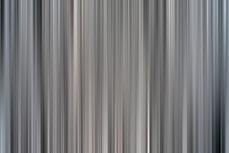 Abstract vertical pink lines background. Streaks are blurry in motion.の写真素材
