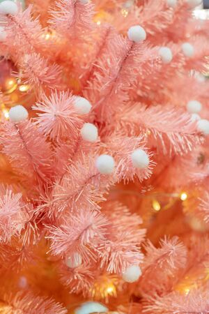 Orange Christmas Fir Tree. Holiday greeting card background.の写真素材