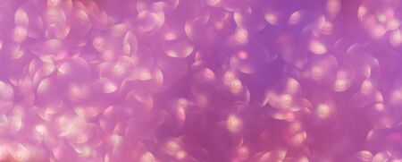 Abstract festive blurry background. Beautiful bokeh. Camera lenses effect. Round spots of light.の写真素材