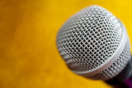 Professional dynamic microphone. Concert microphone for voice recording and sound enhancement. Sound equipment.の写真素材