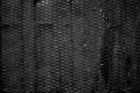 Abstract black background. Black metal texture. Dark rough surface.の写真素材