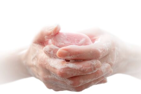 Antibacterial soap in the hands. Hand disinfection with soap. Cleanliness and hygiene in everyday...
