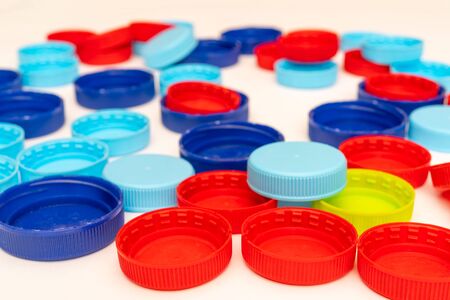 Plastic bottle caps. Separate garbage collection. Waste disposal.の写真素材
