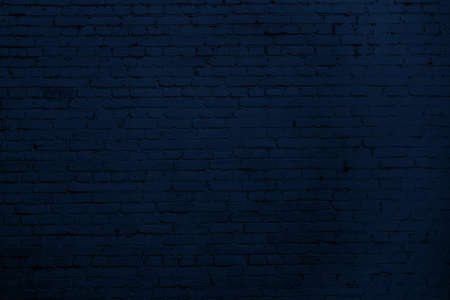 Blue brick wall. Loft interior design. Blue paint of facade.