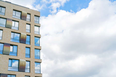 Moscow, Russia, July 24, 2020. Modern office building. Windows of a multi-storey skyscraper. Rows of identical windows.のeditorial素材