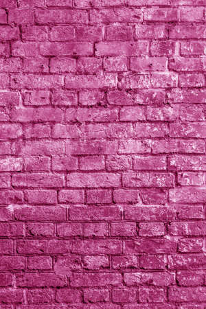 The background of the old pink brick wall for design interior and various scenes or as a background for video interviews.の写真素材