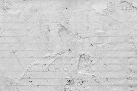 White wall of the building. Rough plaster surface. Abstract background.の写真素材