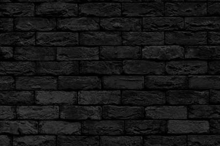 Black brick building wall. Interior of a modern loft. Background for design