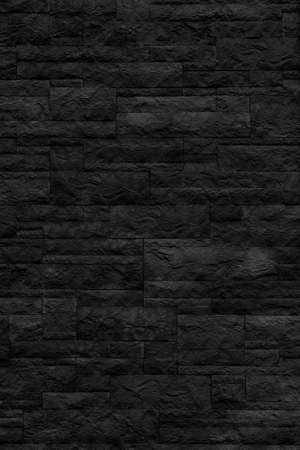 Black brick building wall. Interior of a modern loft. Background for designの写真素材