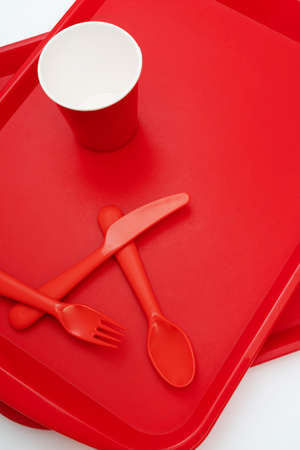 Red plastic food tray in a fast food restaurant.の写真素材