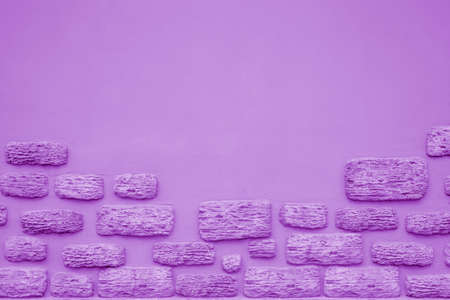 Lilac stone building wall. Interior of a modern loft. Background for design.の写真素材