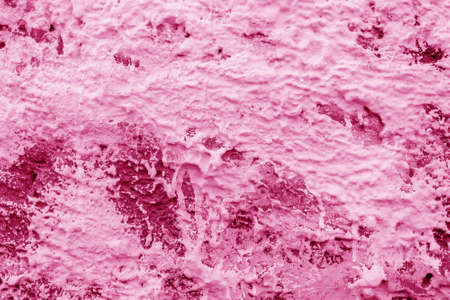 Pink paint texture. Interior of a modern loft. Abstract bright background. The facade of an old house.の写真素材