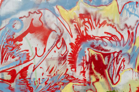 Red and yellow paint on a gray wall. Abstract illustration on stucco.の写真素材
