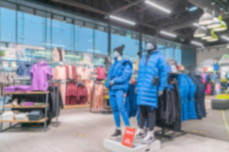 Blurred supermarket. Selling goods in a retail store.の写真素材