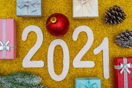 2021 year. Beautiful festive Christmas composition of gifts and toys.の写真素材