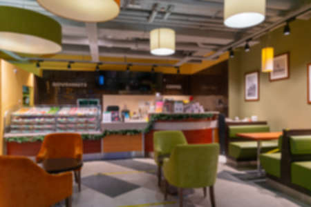 Blurred interior of a modern cafe without visitors.の写真素材
