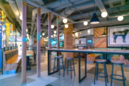 Blurred interior of a modern cafe without visitors.の写真素材