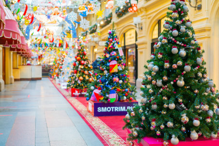 Moscow, Russia. December 08.2020. Beautiful Christmas background. Christmas tree decorated with toys, lights and tinsel.のeditorial素材
