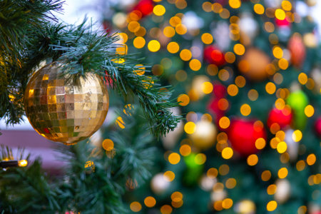 Festively decorated beautiful branches of a Christmas tree.の写真素材