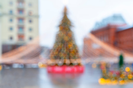 Blurred Festively decorated beautiful branches of a Christmas tree.の写真素材