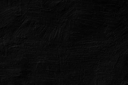 Texture of black plaster on the wall of an old house. Architectural design.の写真素材