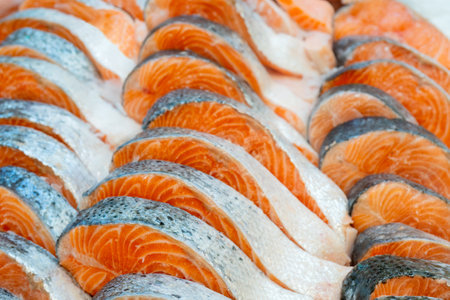 Fresh salmon steaks. Selling seafood in a supermarket.の写真素材