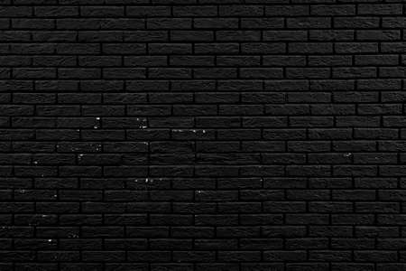 Black brick building wall. Interior of a modern loft. Background for designの写真素材