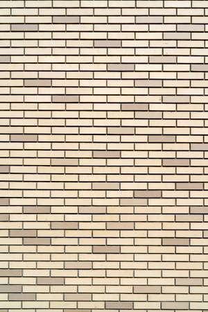 Beige brick building wall. Interior of a modern loft. Background for design.の写真素材