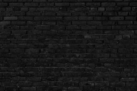 Black brick building wall. Interior of a modern loft. Background for designの写真素材