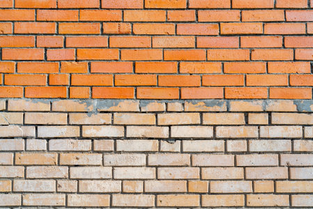 Orange brick building wall. Interior of a modern loft. Background for design