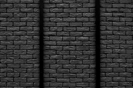 Black brick building wall. Interior of a modern loft. Background for designの写真素材