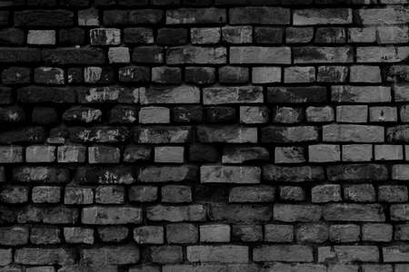 Black brick building wall. Interior of a modern loft. Background for designの写真素材