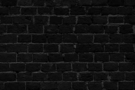 Black brick building wall. Interior of a modern loft. Background for designの写真素材