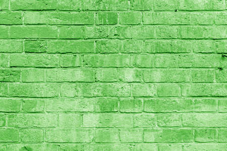 Green brick building wall. Interior of a modern loft. Background for designの写真素材