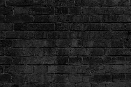 Black brick building wall. Interior of a modern loft. Background for designの写真素材