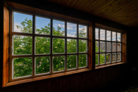 Wooden house in the forest. Individual construction of cottages.
