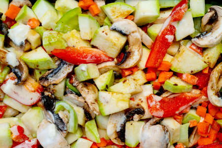 Fresh chopped vegetables and champignons. Healthy food and healthy lifestyle.の写真素材